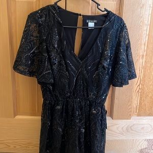 Never worn black sequin romper NWT